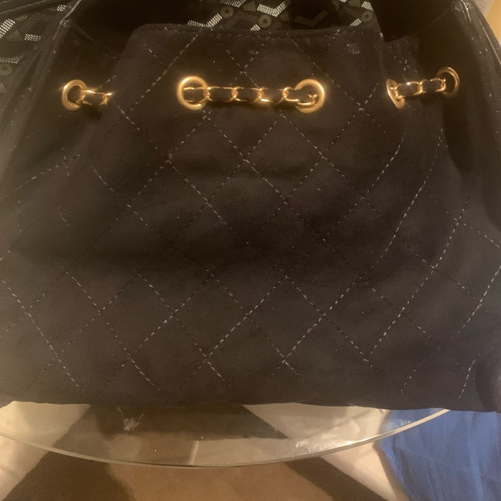 Elegant Black Suede Quilted Shoulder Bag
Brown and tan are sold - Picture 2 of 2